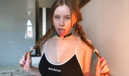 A young girl with pigtails with a sweet blowjob pleased her friend