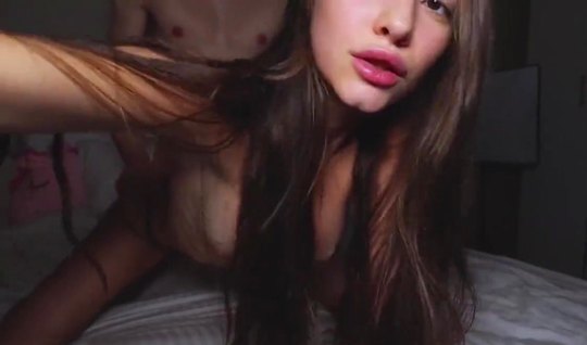 Young slim girl in panties on the bed shows Russian homemade porn